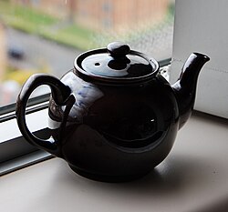 A black teapot